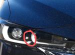 马自达CX-5 杠5的大灯中间有一个小的灯，这是干什么用的，没见亮过？